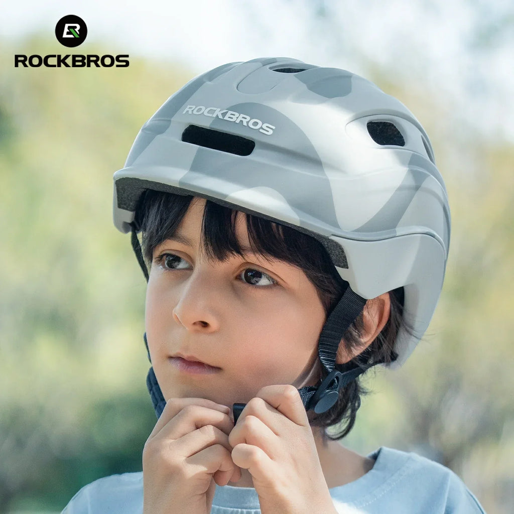 ROCKBROS colourful kids bike helmet with vibrant design, providing reliable protection, adjustable fit, and comfort for young riders. 