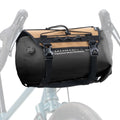 Black and beige bike bag attached to a bicycle on a white background