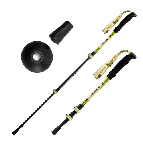Two hiking poles with camouflage grips and black ferrules on a white background#color_yellow