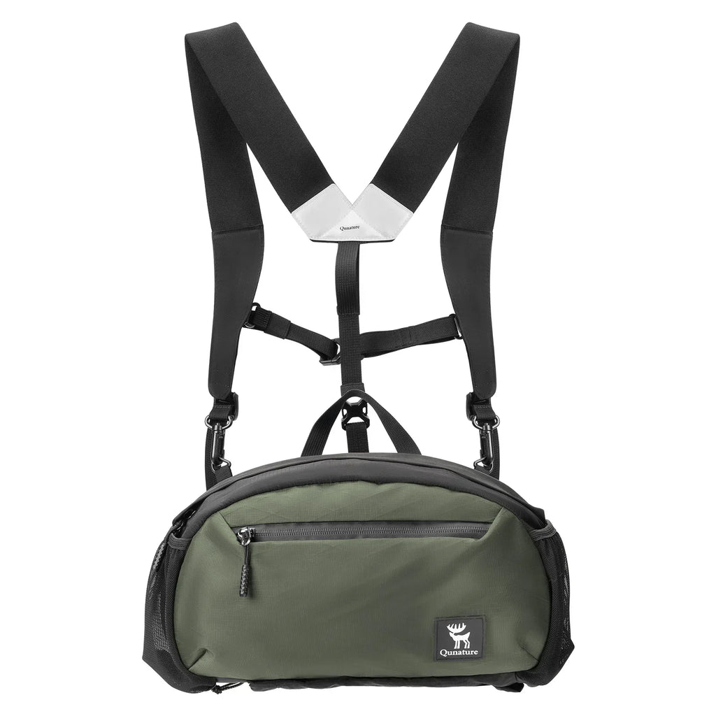 Green and black crossbody bag with adjustable straps on a white background#Color_green